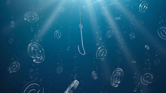 A fishing hook suspended underwater surrounded by bubbles and floating "@" symbols, symbolizing the